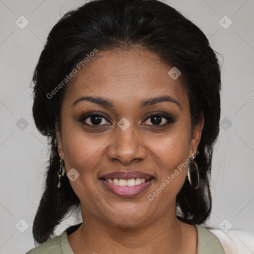 Joyful black young-adult female with medium  brown hair and brown eyes