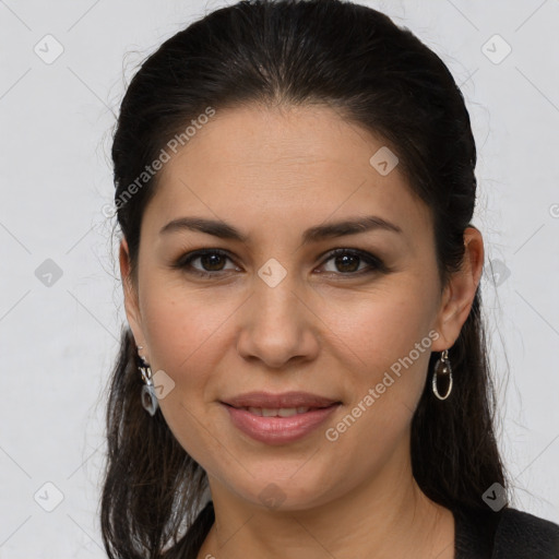 Joyful white young-adult female with long  brown hair and brown eyes