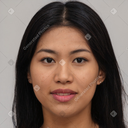 Joyful asian young-adult female with long  brown hair and brown eyes