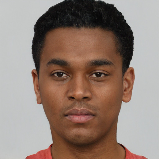 Neutral black young-adult male with short  black hair and brown eyes