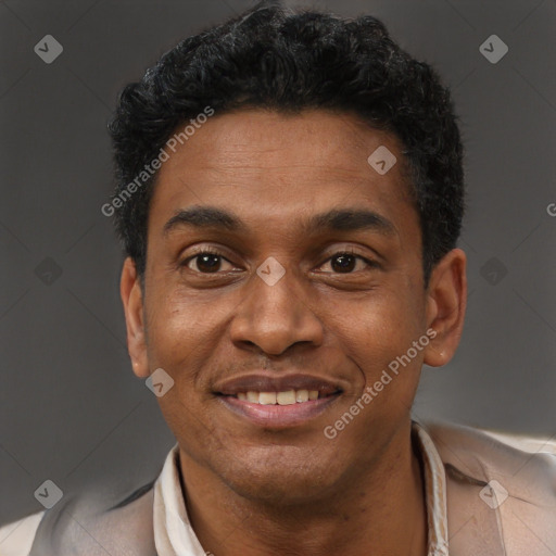 Joyful latino adult male with short  black hair and brown eyes