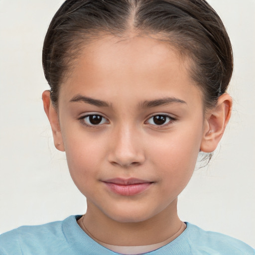 Joyful white child female with short  brown hair and brown eyes