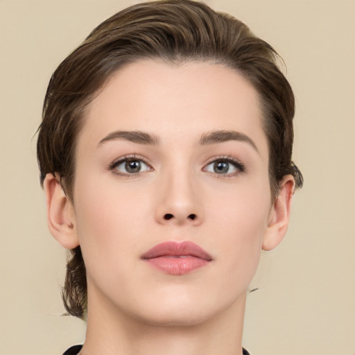 Neutral white young-adult female with medium  brown hair and brown eyes