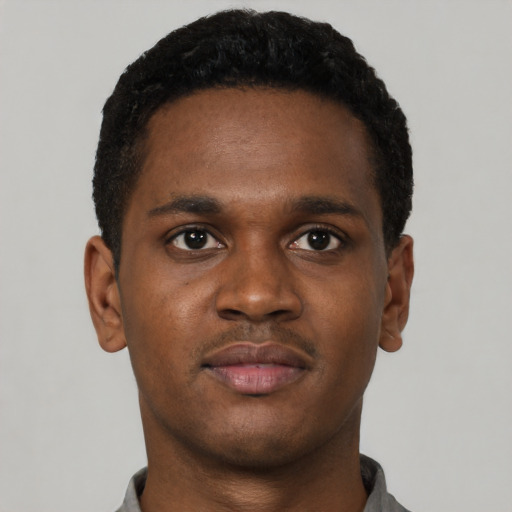 Neutral black young-adult male with short  brown hair and brown eyes