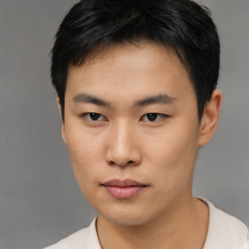 Neutral asian young-adult male with short  black hair and brown eyes