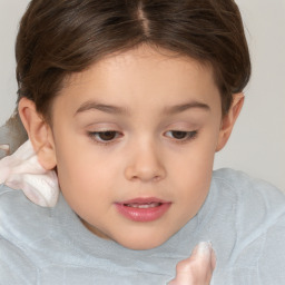 Joyful white child female with short  brown hair and brown eyes