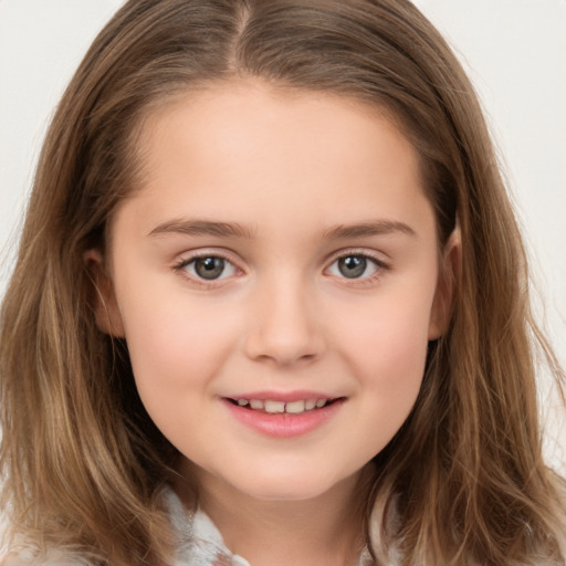 Joyful white child female with long  brown hair and brown eyes