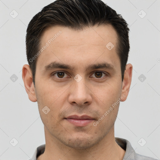 Joyful white young-adult male with short  brown hair and brown eyes