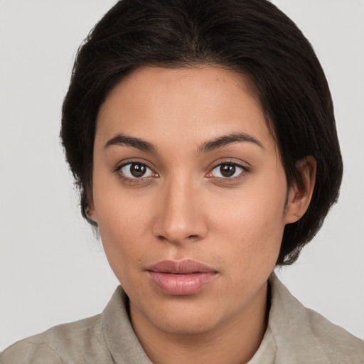 Neutral white young-adult female with medium  brown hair and brown eyes