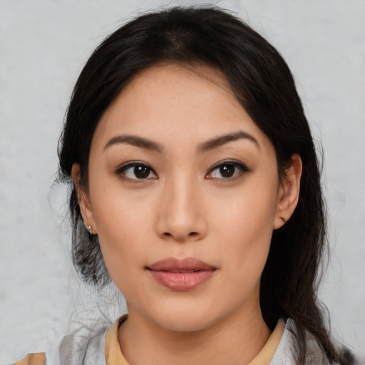 Neutral latino young-adult female with medium  black hair and brown eyes