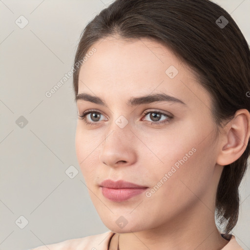 Neutral white young-adult female with medium  brown hair and brown eyes