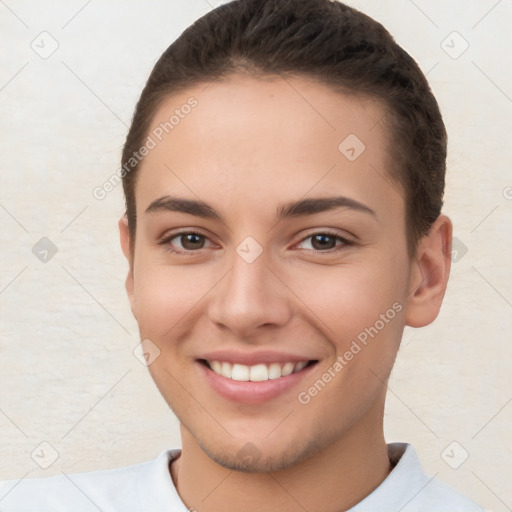 Joyful white young-adult female with short  brown hair and brown eyes