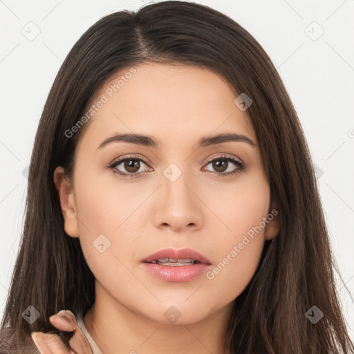 Neutral white young-adult female with long  brown hair and brown eyes