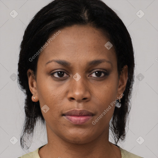 Joyful black young-adult female with medium  black hair and brown eyes