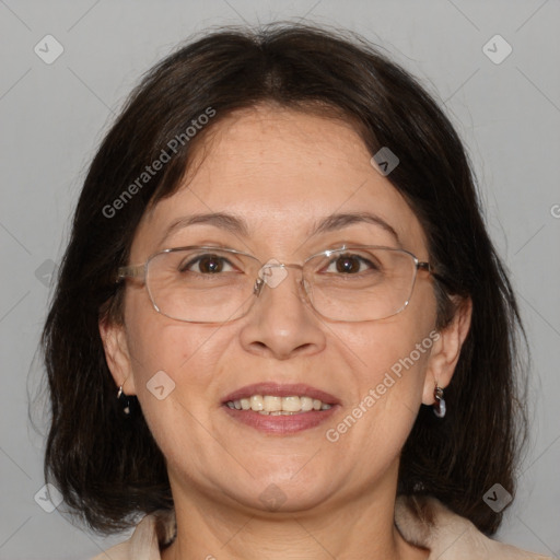 Joyful white adult female with medium  brown hair and brown eyes