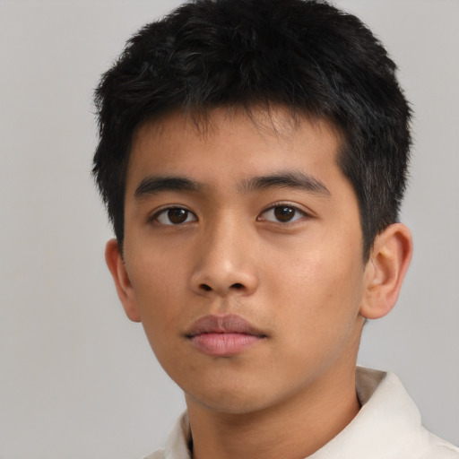 Neutral asian child male with short  brown hair and brown eyes
