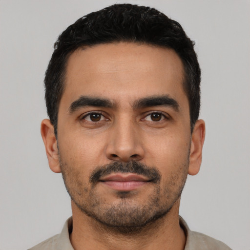 Neutral latino young-adult male with short  black hair and brown eyes