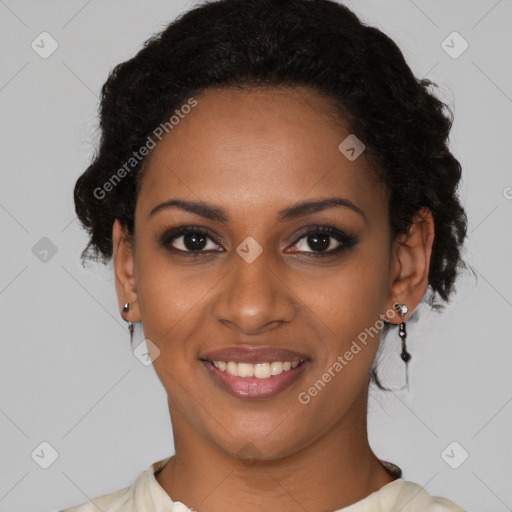 Joyful black young-adult female with medium  black hair and brown eyes