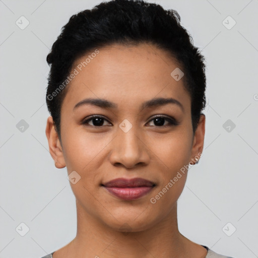 Joyful latino young-adult female with short  black hair and brown eyes