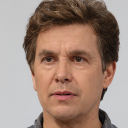 Neutral white adult male with short  brown hair and brown eyes