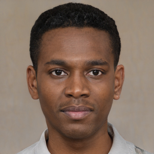 Neutral black young-adult male with short  brown hair and brown eyes