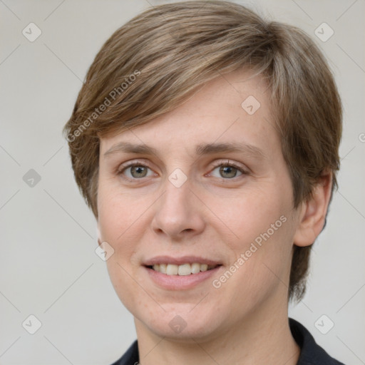 Joyful white adult female with medium  brown hair and grey eyes