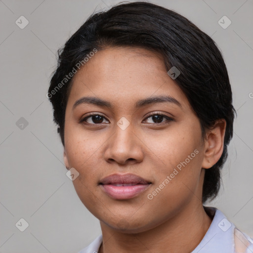 Joyful asian young-adult female with short  black hair and brown eyes