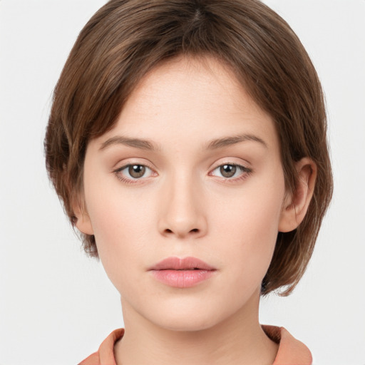 Neutral white young-adult female with short  brown hair and grey eyes