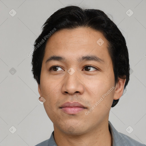 Neutral latino adult male with short  black hair and brown eyes