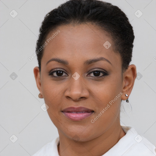 Joyful black young-adult female with short  brown hair and brown eyes