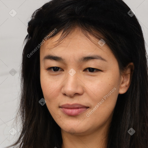 Joyful asian young-adult female with long  brown hair and brown eyes