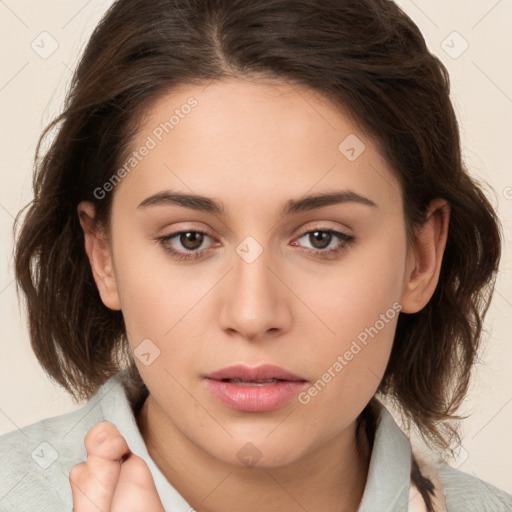 Neutral white young-adult female with medium  brown hair and brown eyes