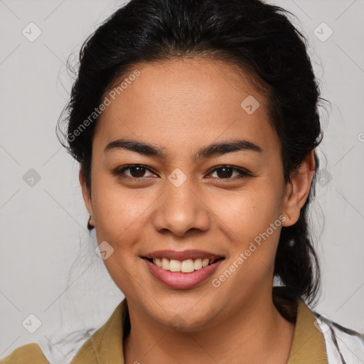 Joyful latino young-adult female with medium  brown hair and brown eyes