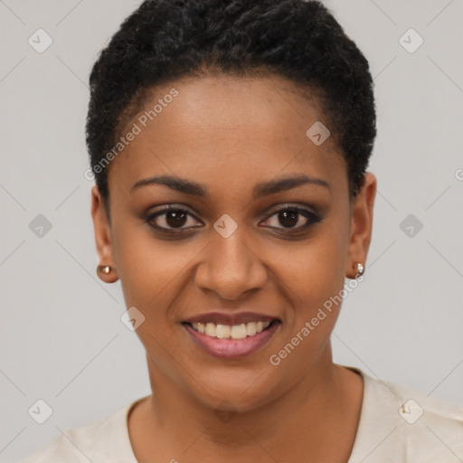 Joyful black young-adult female with short  black hair and brown eyes