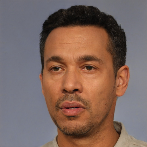 Neutral white adult male with short  black hair and brown eyes