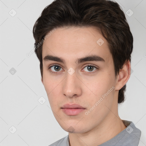 Neutral white young-adult male with short  brown hair and brown eyes