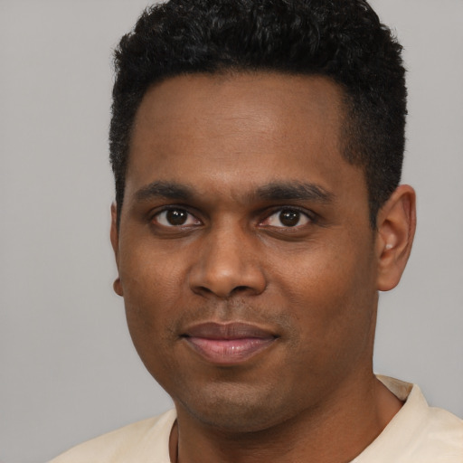 Neutral black young-adult male with short  black hair and brown eyes
