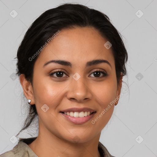 Joyful latino young-adult female with medium  brown hair and brown eyes