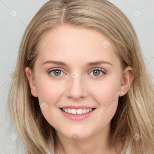 Joyful white young-adult female with long  brown hair and grey eyes