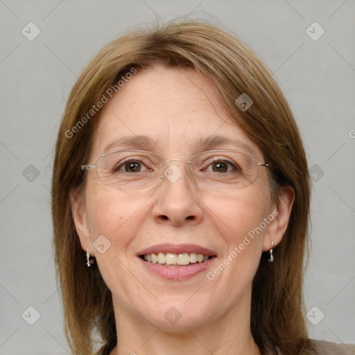 Joyful white adult female with medium  brown hair and grey eyes