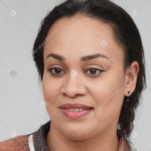 Joyful latino young-adult female with medium  brown hair and brown eyes