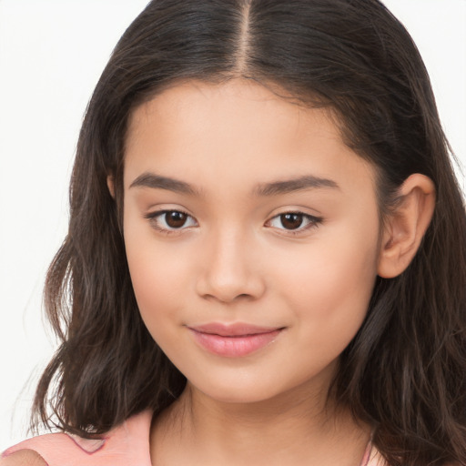 Joyful white child female with long  brown hair and brown eyes