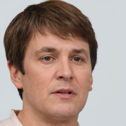 Neutral white adult male with short  brown hair and brown eyes