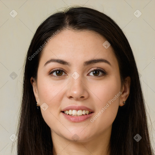 Joyful white young-adult female with long  brown hair and brown eyes