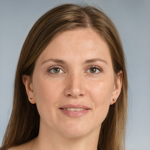 Joyful white young-adult female with long  brown hair and grey eyes