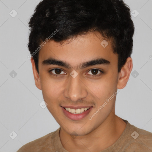 Joyful latino young-adult male with short  brown hair and brown eyes