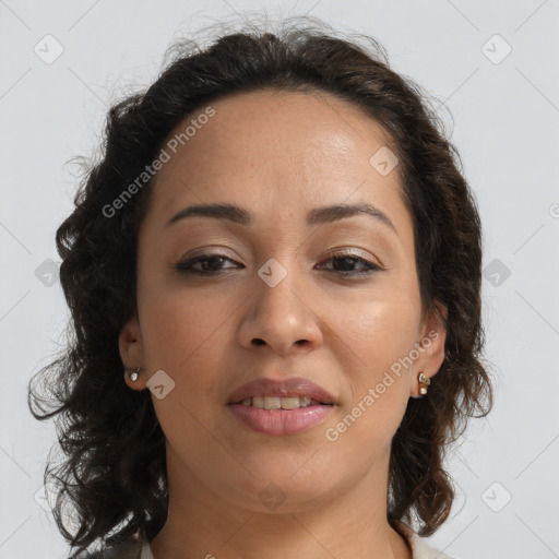 Joyful white adult female with long  brown hair and brown eyes