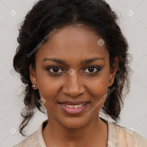 Joyful black young-adult female with long  brown hair and brown eyes