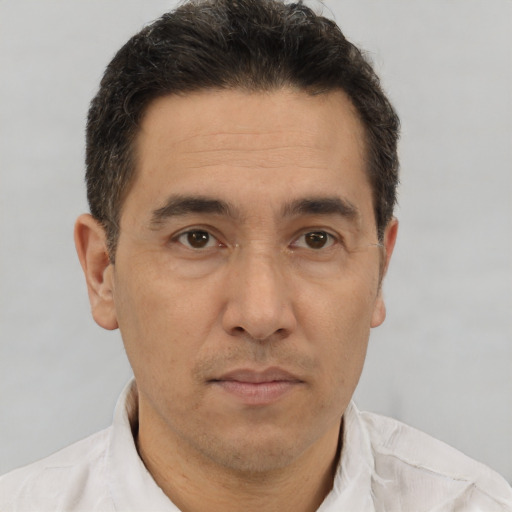 Neutral white adult male with short  brown hair and brown eyes