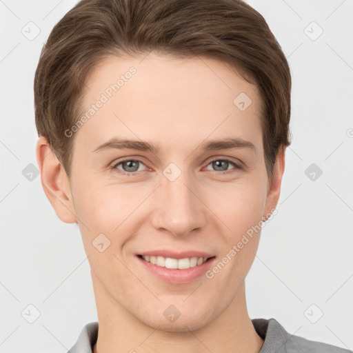 Joyful white young-adult female with short  brown hair and grey eyes